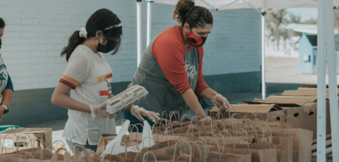 volunteers helping community volunteers helping community